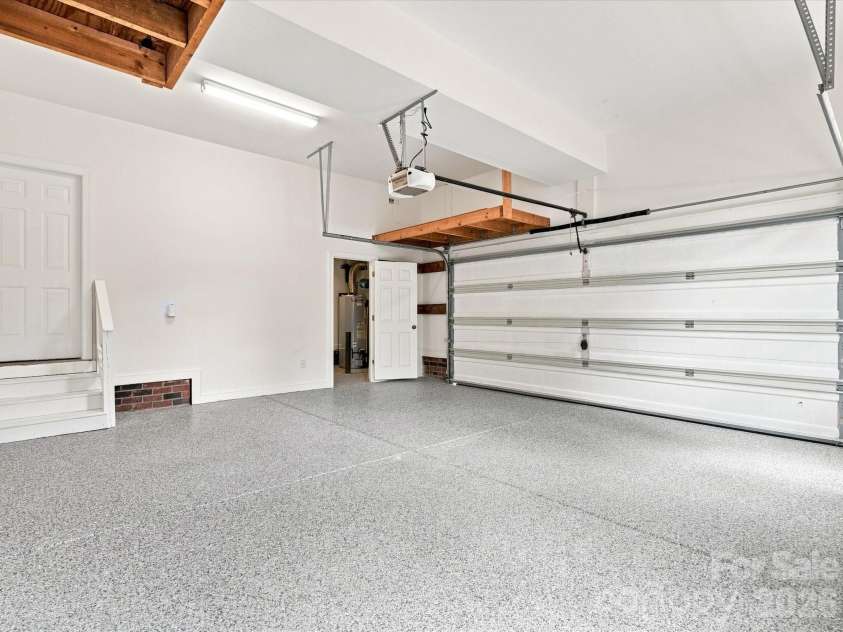 1012 Easthampton Lane, Waxhaw, NC 28173.  MLS# CAR4406705, YatesRealty ID 43403. Finished garage with storage room