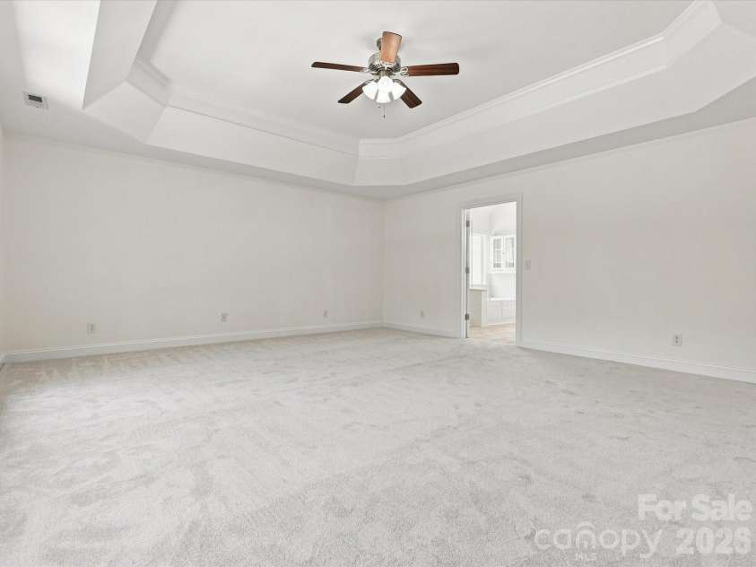1012 Easthampton Lane, Waxhaw, NC 28173.  MLS# CAR4406705, YatesRealty ID 43403. Primary bedrom - upper level- trey ceiling