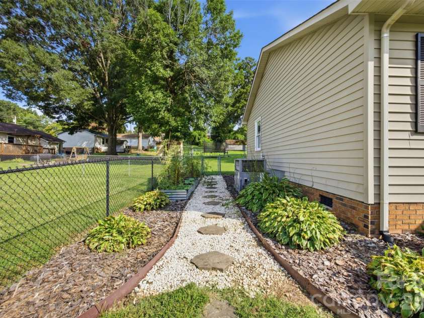 165 Obrien Place, Concord, NC 28025.  MLS# CAR4411507, YatesRealty ID 43408. Exterior Left Side