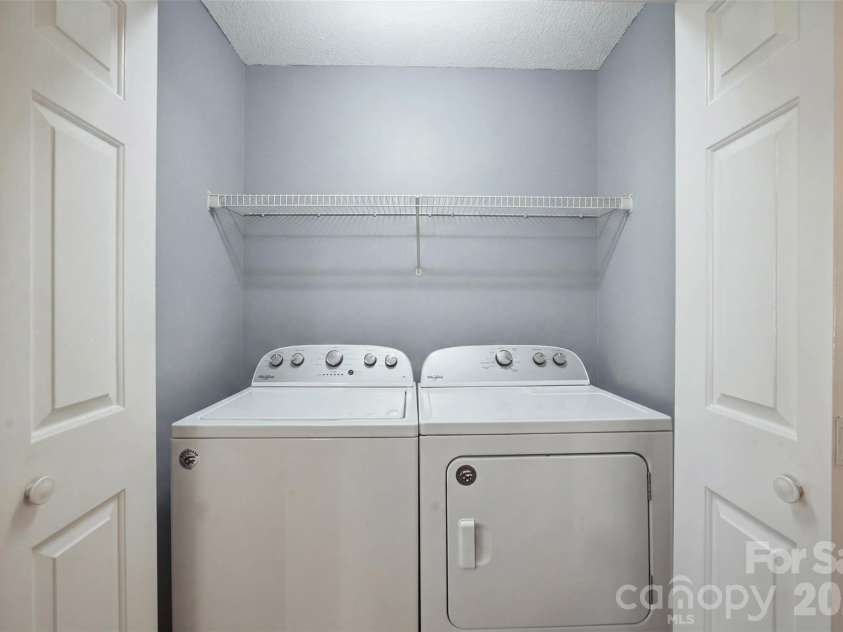 165 Obrien Place, Concord, NC 28025.  MLS# CAR4411507, YatesRealty ID 43408. Laundry Closet in Kitchen