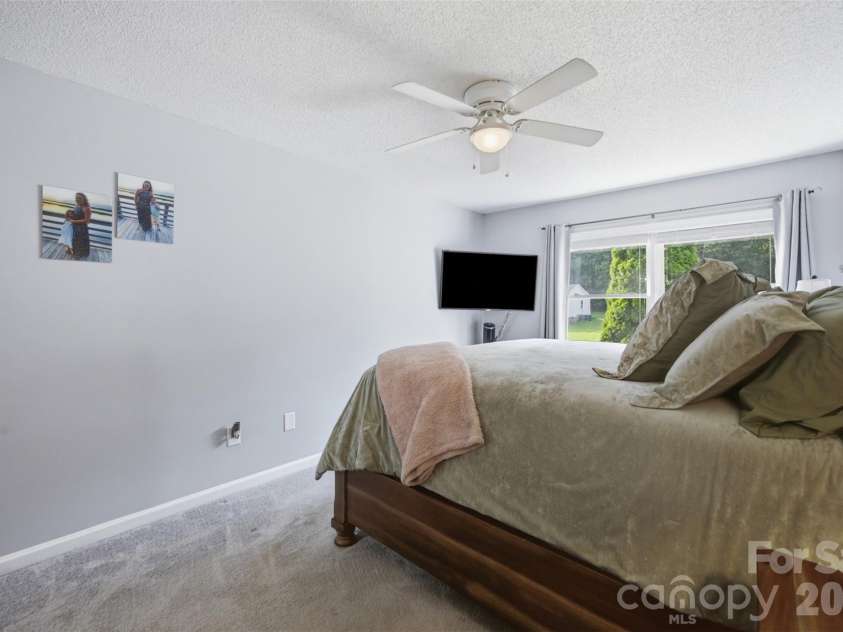 165 Obrien Place, Concord, NC 28025.  MLS# CAR4411507, YatesRealty ID 43408. Primary Bedroom