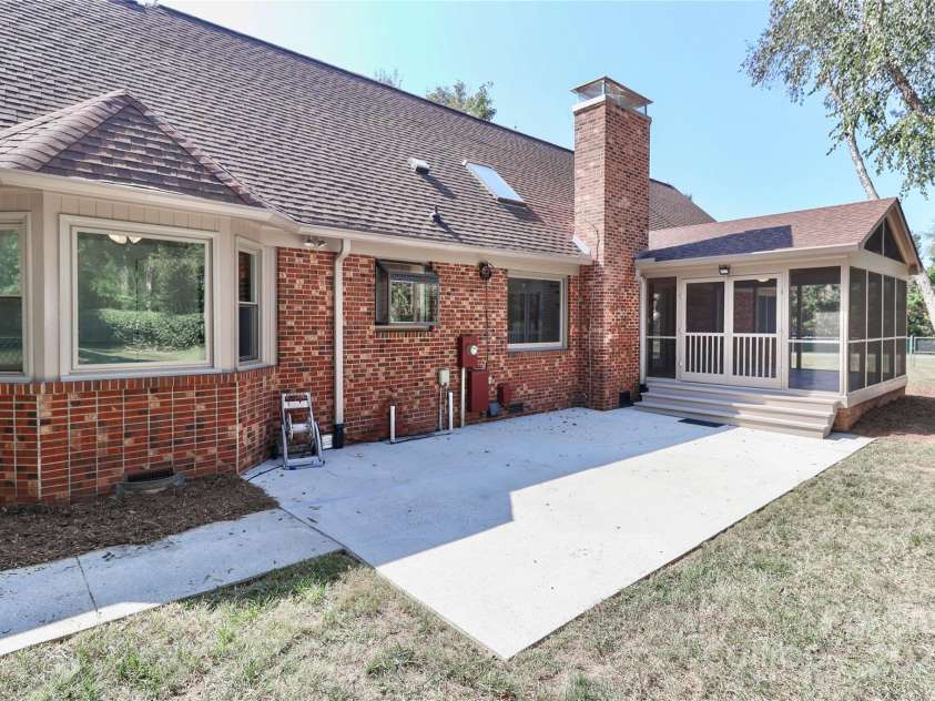 1051 Michael Avenue, Concord, NC 28025.  MLS# CAR4304116, YatesRealty ID 4341. Back of home