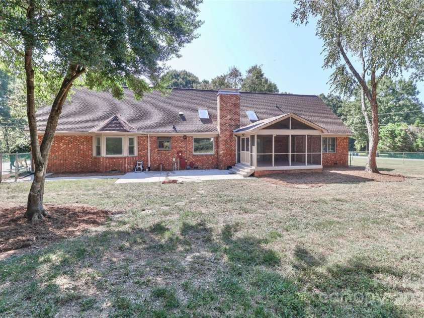 1051 Michael Avenue, Concord, NC 28025.  MLS# CAR4304116, YatesRealty ID 4341. Back of home