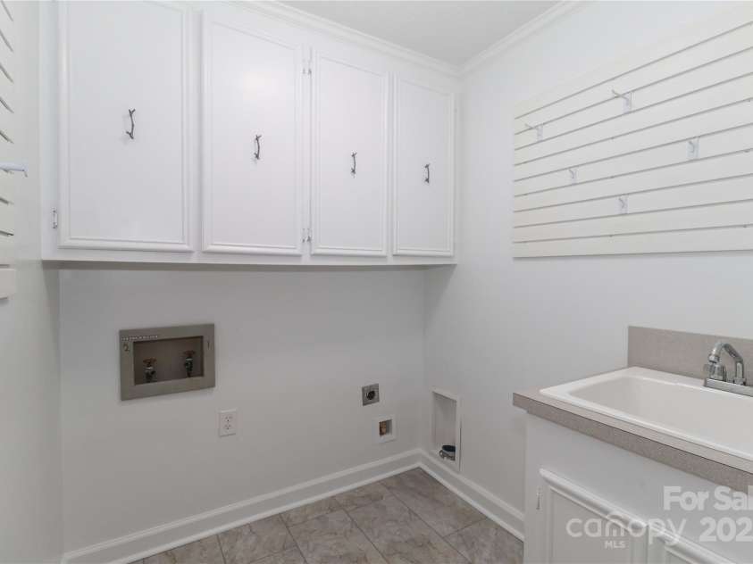 1051 Michael Avenue, Concord, NC 28025.  MLS# CAR4304116, YatesRealty ID 4341. Laundry room