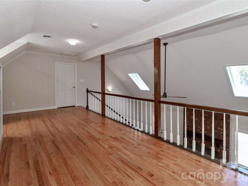1051 Michael Avenue, Concord, NC 28025.  MLS# CAR4427422, YatesRealty ID 4341. Loft facing bedroom