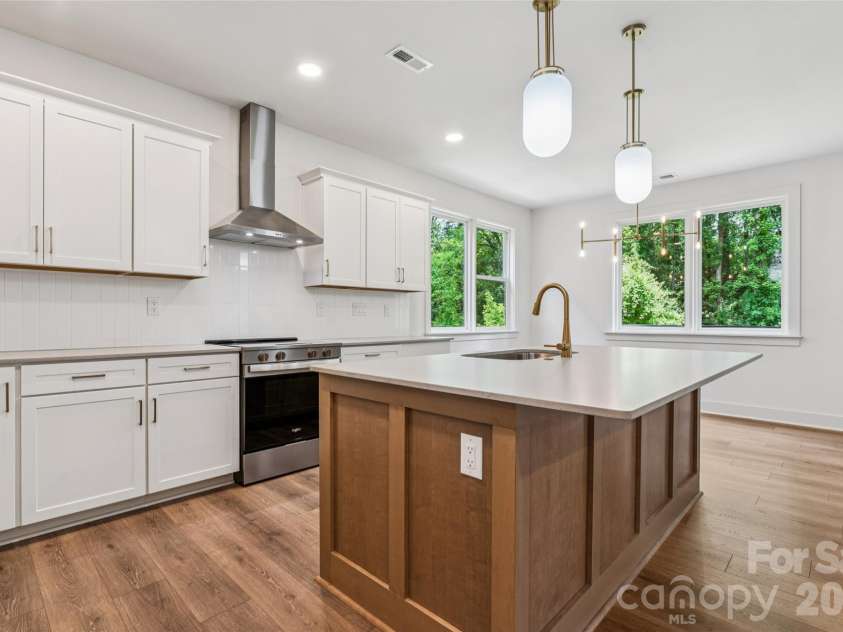 2412 Crestview Drive, Charlotte, NC 28216.  MLS# CAR4332817, YatesRealty ID 43411. 