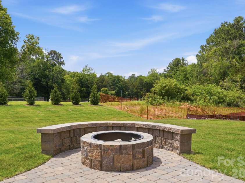 545 Cheryl Lynn Drive, Rock Hill, SC 29730.  MLS# CAR4314000, YatesRealty ID 43414. Outdoor firepit