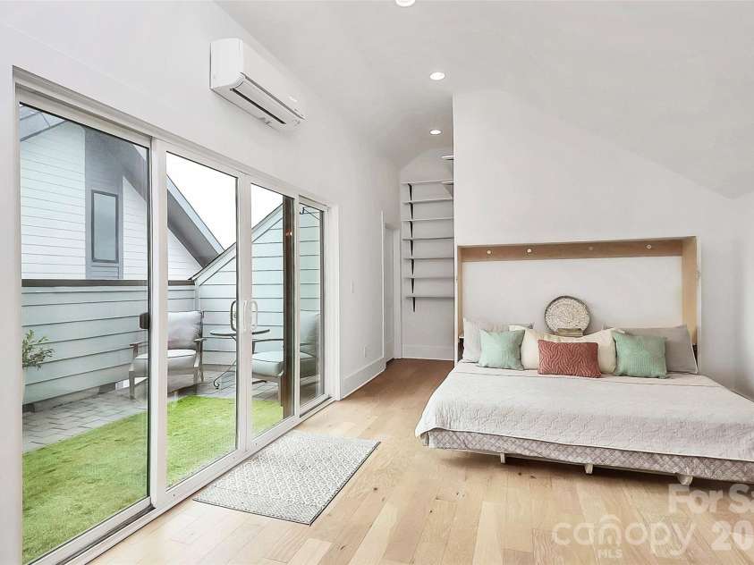 1004 Margaret Brown Street, Charlotte, NC 28202.  MLS# CAR4341341, YatesRealty ID 4342. Custom-built Murphy bed makes this delightful space special!