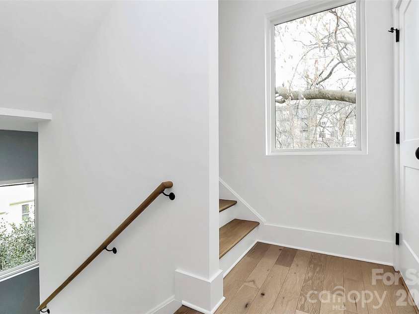 1004 Margaret Brown Street, Charlotte, NC 28202.  MLS# CAR4341341, YatesRealty ID 4342. Laundry closet convenient to bedrooms