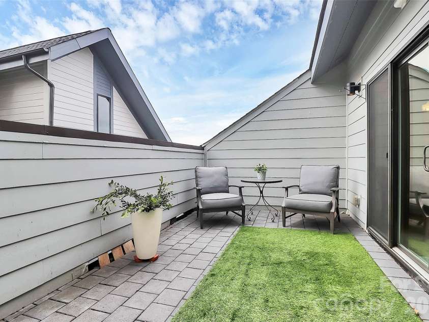 1004 Margaret Brown Street, Charlotte, NC 28202.  MLS# CAR4341341, YatesRealty ID 4342. Private rooftop terrace with pavers 