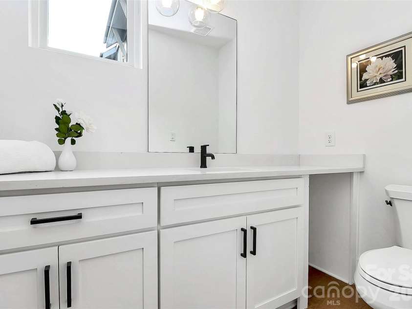 1004 Margaret Brown Street, Charlotte, NC 28202.  MLS# CAR4341341, YatesRealty ID 4342. Roomy & bright powder room