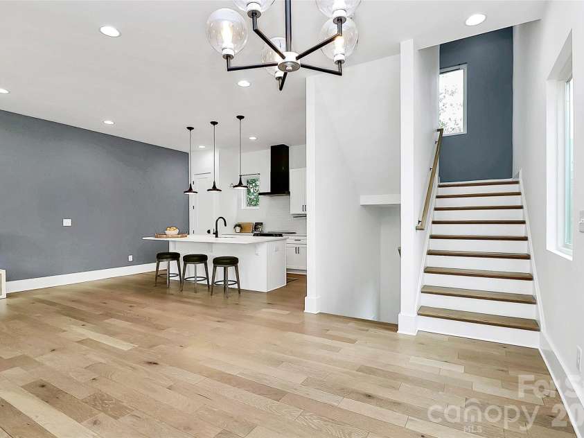 1004 Margaret Brown Street, Charlotte, NC 28202.  MLS# CAR4341341, YatesRealty ID 4342. Stairs to upper level bedrooms