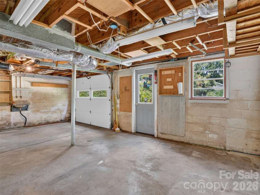 3112 Wesley Way, Hendersonville, NC 28792.  MLS# CAR4393295, YatesRealty ID 43422. Basement