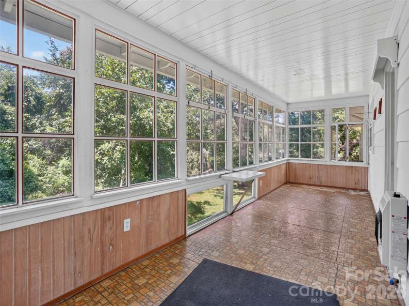 3112 Wesley Way, Hendersonville, NC 28792.  MLS# CAR4393295, YatesRealty ID 43422. Sunroom