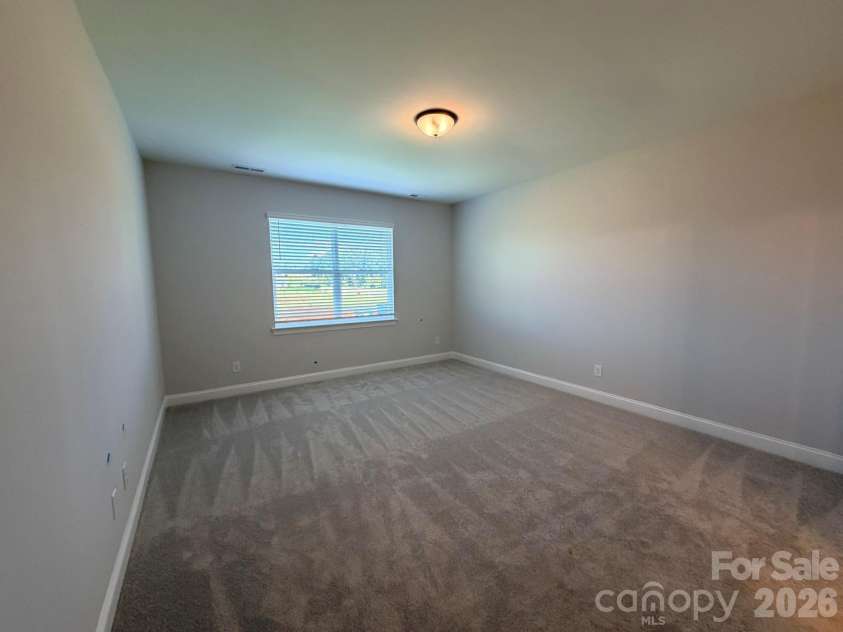 126 Swing Way, Troutman, NC 28166.  MLS# CAR4361197, YatesRealty ID 43426. Primary Bedroom