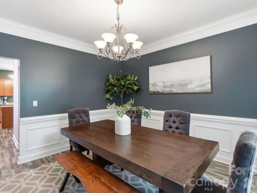 4012 Magna Lane, Indian Trail, NC 28079.  MLS# CAR4406067, YatesRealty ID 43428. Dining Room with picture frame molding
