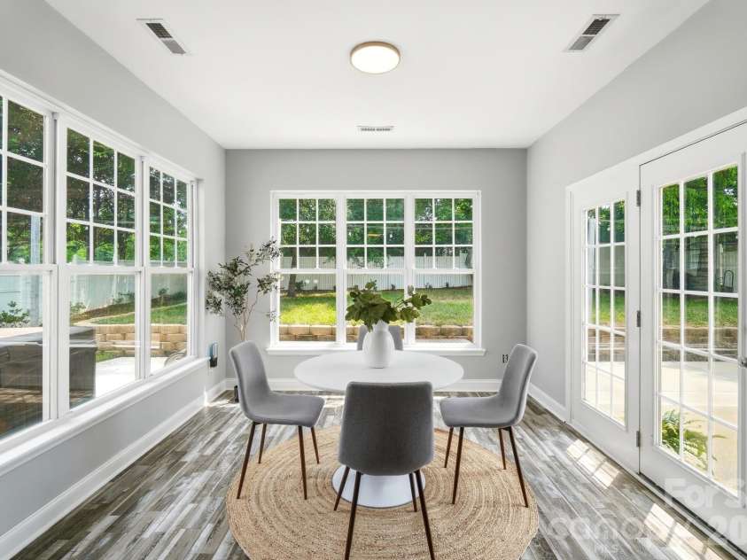 4012 Magna Lane, Indian Trail, NC 28079.  MLS# CAR4406067, YatesRealty ID 43428. Sunroom as a breakfast room