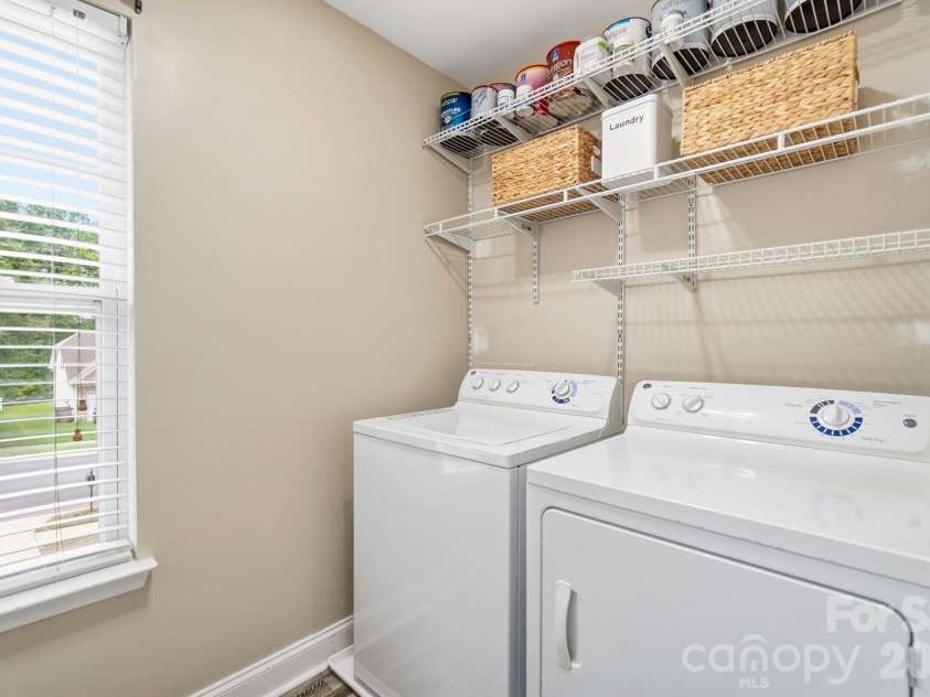 4012 Magna Lane, Indian Trail, NC 28079.  MLS# CAR4406067, YatesRealty ID 43428. Upstairs Laundry Room