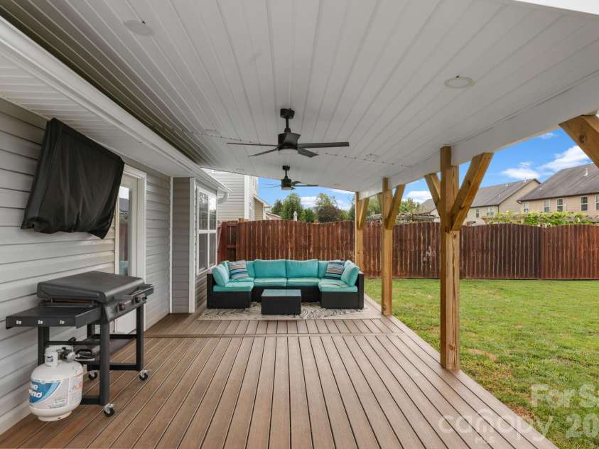 38 Swift Creek Road, Fletcher, NC 28732.  MLS# CAR4413566, YatesRealty ID 43429. Back deck is perfect for hanging out