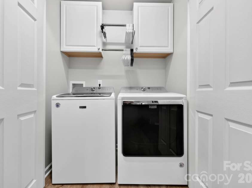 38 Swift Creek Road, Fletcher, NC 28732.  MLS# CAR4413566, YatesRealty ID 43429. Storage in laundry closet