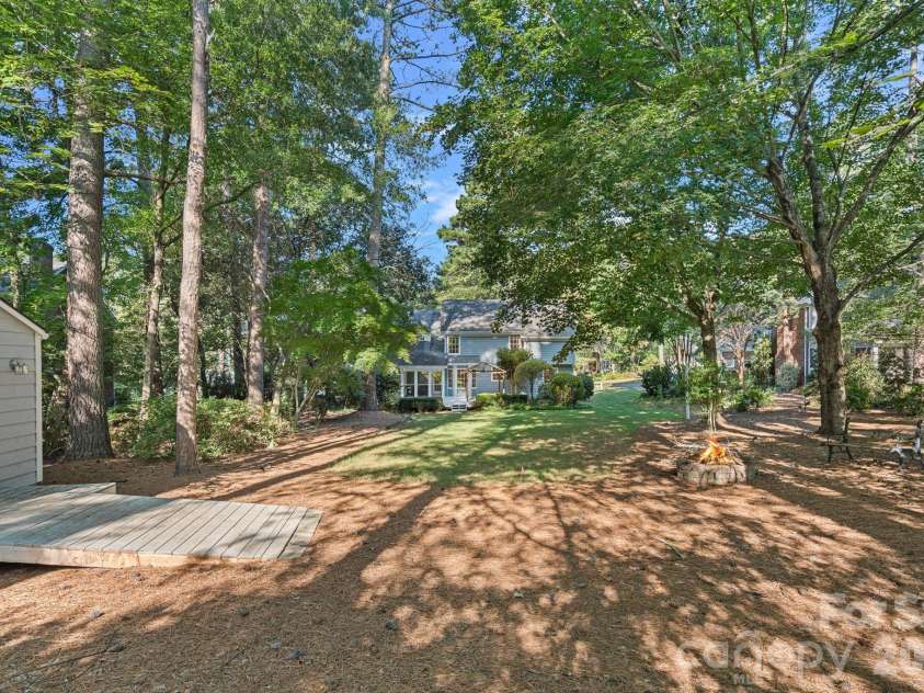 121 Lake Pine Road, Mooresville, NC 28117.  MLS# CAR4404484, YatesRealty ID 43433. Great Firepit out Back