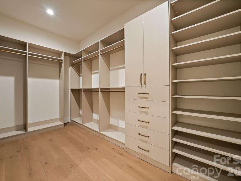 21617 Rio Oro Drive, Cornelius, NC 28031.  MLS# CAR4411277, YatesRealty ID 43438. Expansive walk-in closet #2