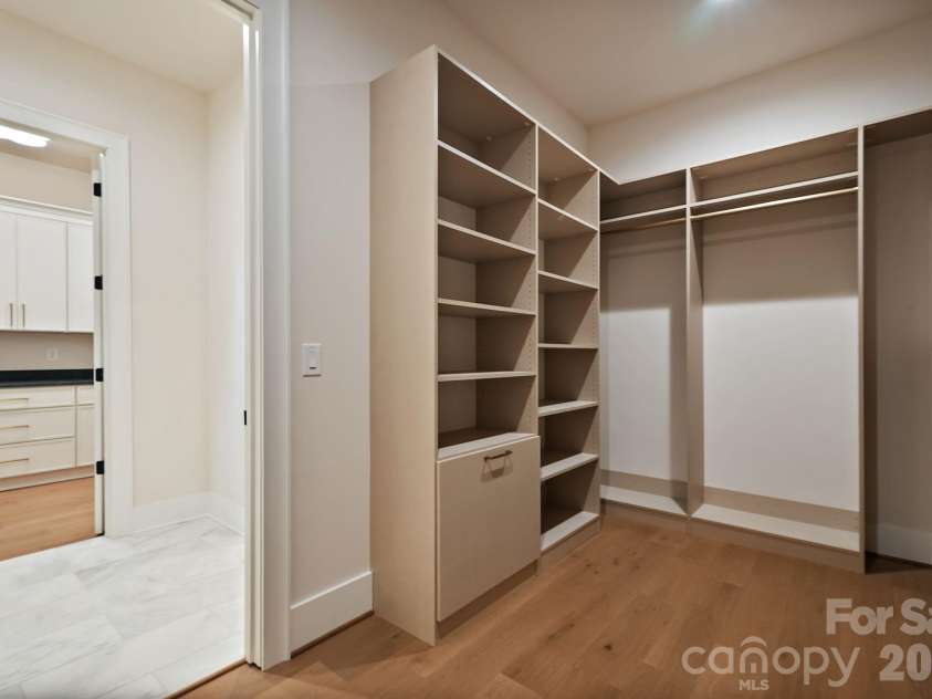 21617 Rio Oro Drive, Cornelius, NC 28031.  MLS# CAR4411277, YatesRealty ID 43438. Expansive walk-in closet #2.