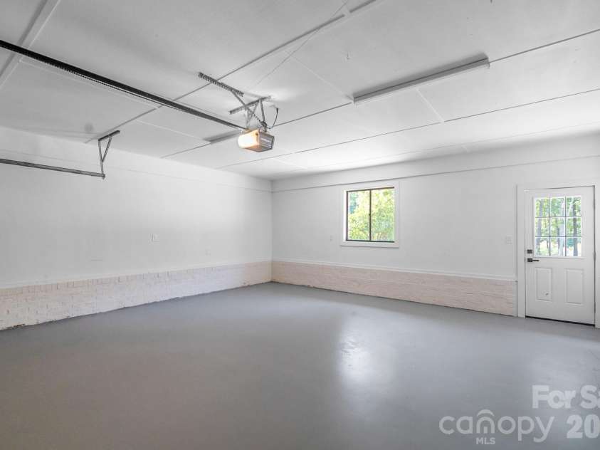 5033 Waxhaw Indian Trail Road, Matthews, NC 28104.  MLS# CAR4398876, YatesRealty ID 43444. Garage