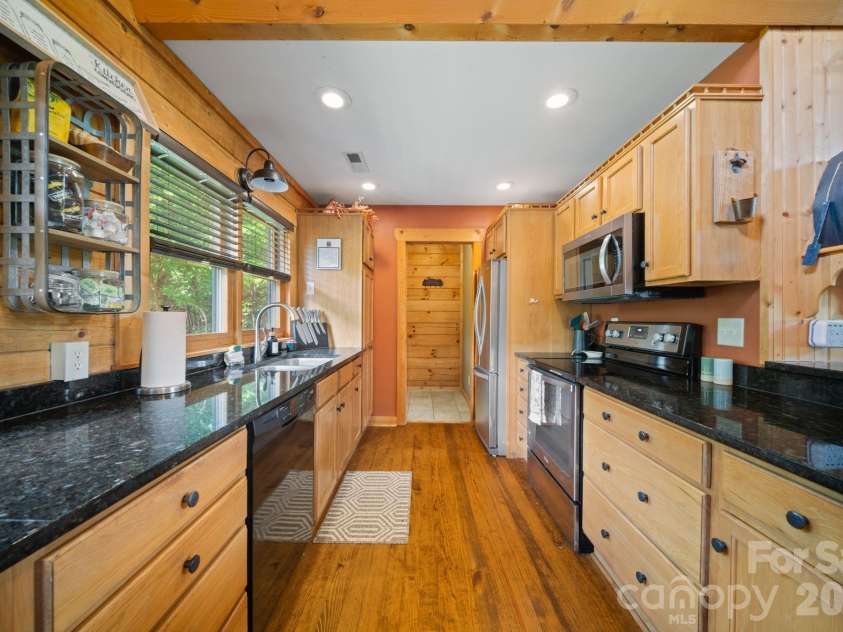 417 Garden Lane, Lake Lure, NC 28746.  MLS# CAR4411192, YatesRealty ID 43446. 