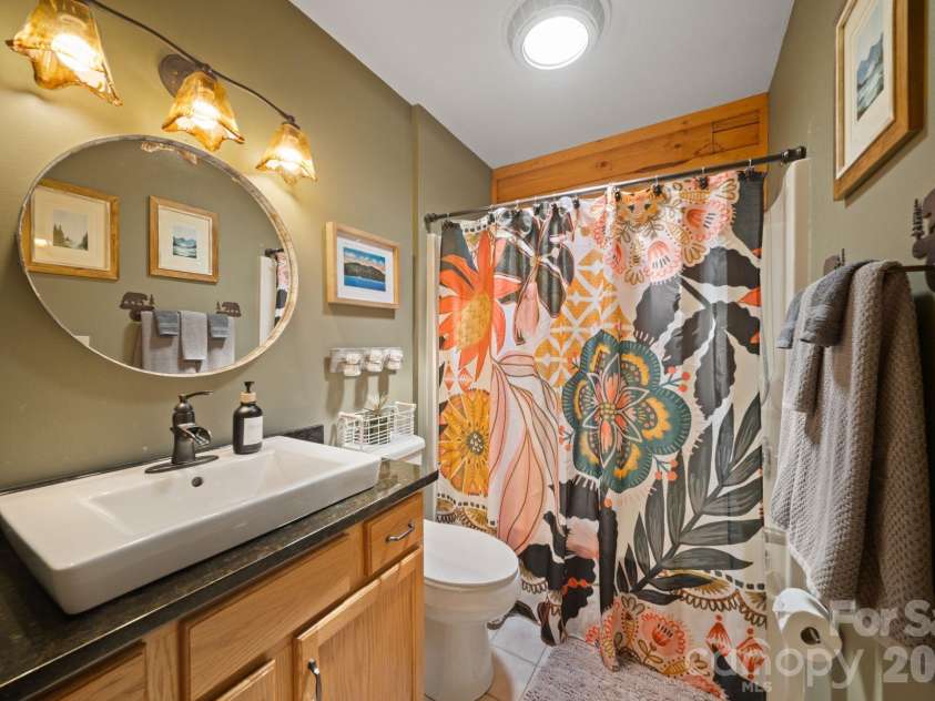 417 Garden Lane, Lake Lure, NC 28746.  MLS# CAR4411192, YatesRealty ID 43446. 