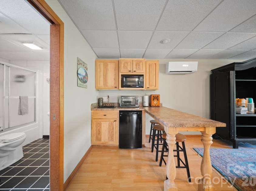417 Garden Lane, Lake Lure, NC 28746.  MLS# CAR4411192, YatesRealty ID 43446. 