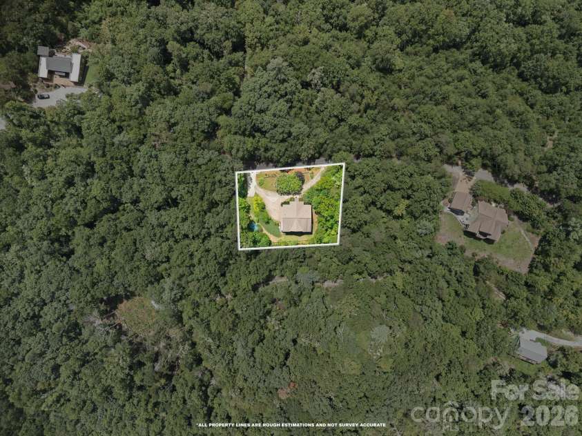 417 Garden Lane, Lake Lure, NC 28746.  MLS# CAR4411192, YatesRealty ID 43446. 