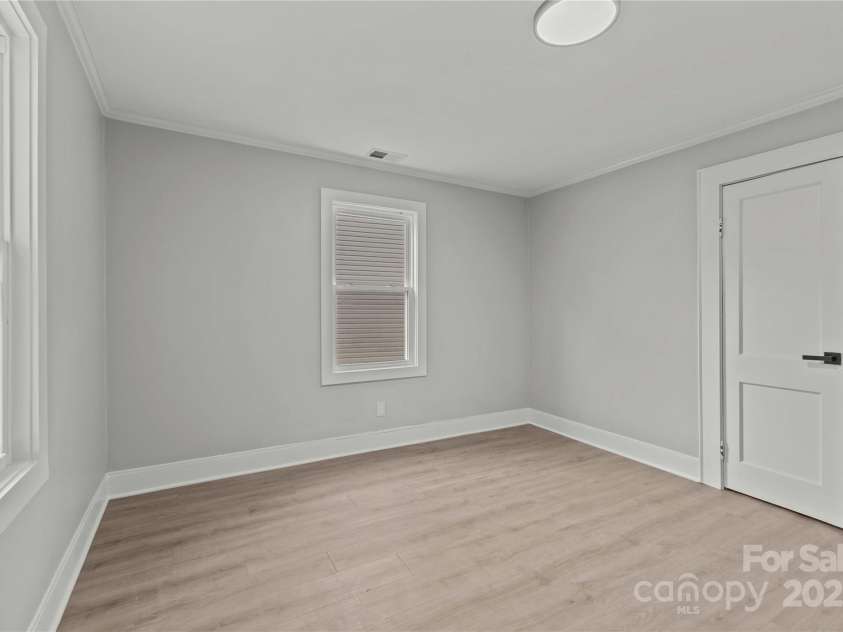816 Miller Street, Gastonia, NC 28052.  MLS# CAR4297587, YatesRealty ID 4345. Left front bedroom