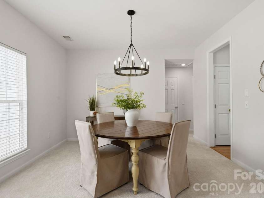 12003 Planters Estates Drive, Charlotte, NC 28278.  MLS# CAR4408406, YatesRealty ID 43450. Bright and spacious dining room