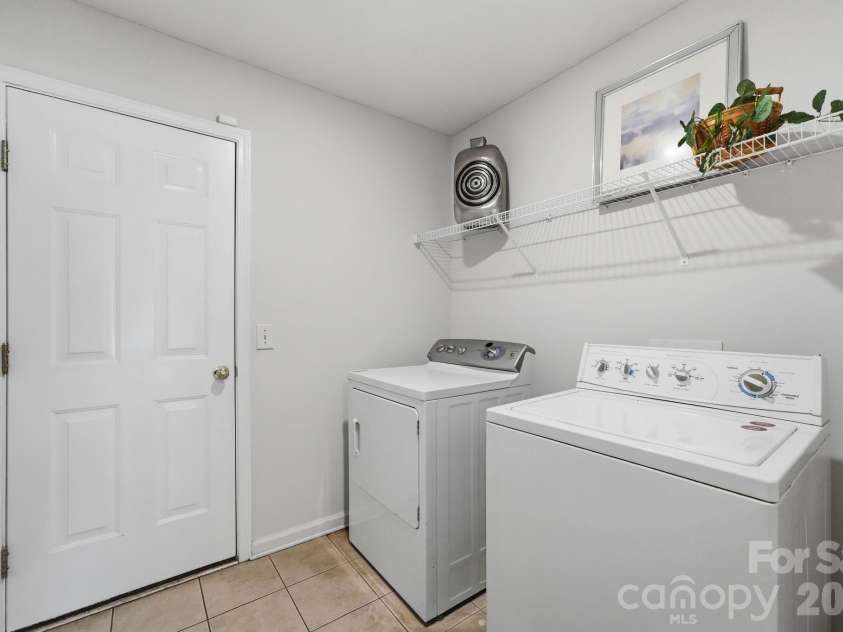 12003 Planters Estates Drive, Charlotte, NC 28278.  MLS# CAR4408406, YatesRealty ID 43450. First floor laundry room