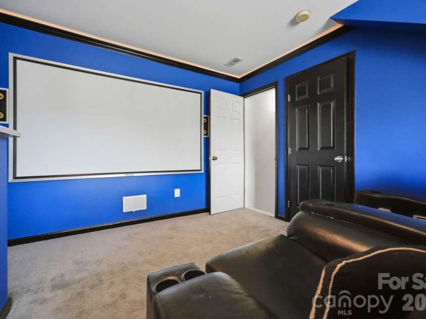 12003 Planters Estates Drive, Charlotte, NC 28278.  MLS# CAR4408406, YatesRealty ID 43450. Large projection screen
