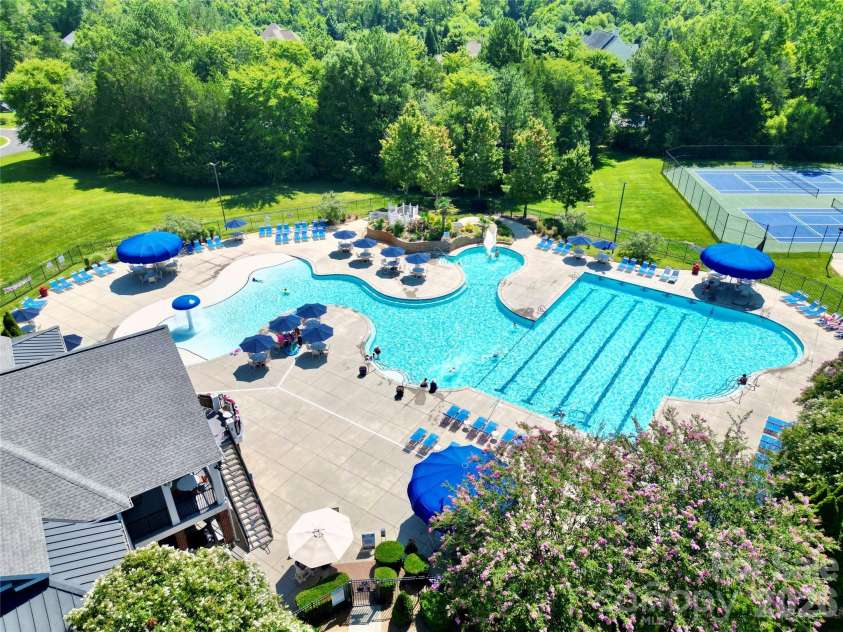 3826 Isenhour Road, Kannapolis, NC 28081.  MLS# CAR4400759, YatesRealty ID 43457. Pool with Splash pad area and slide