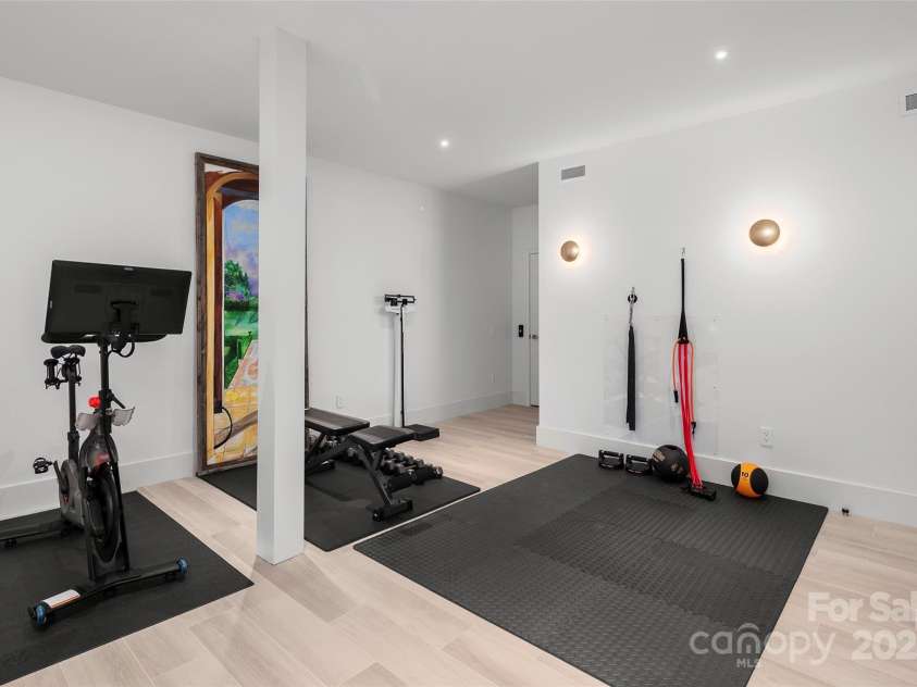 214 Folkestone Lane, Arden, NC 28704.  MLS# CAR4185863, YatesRealty ID 4346. Home Fitness Room