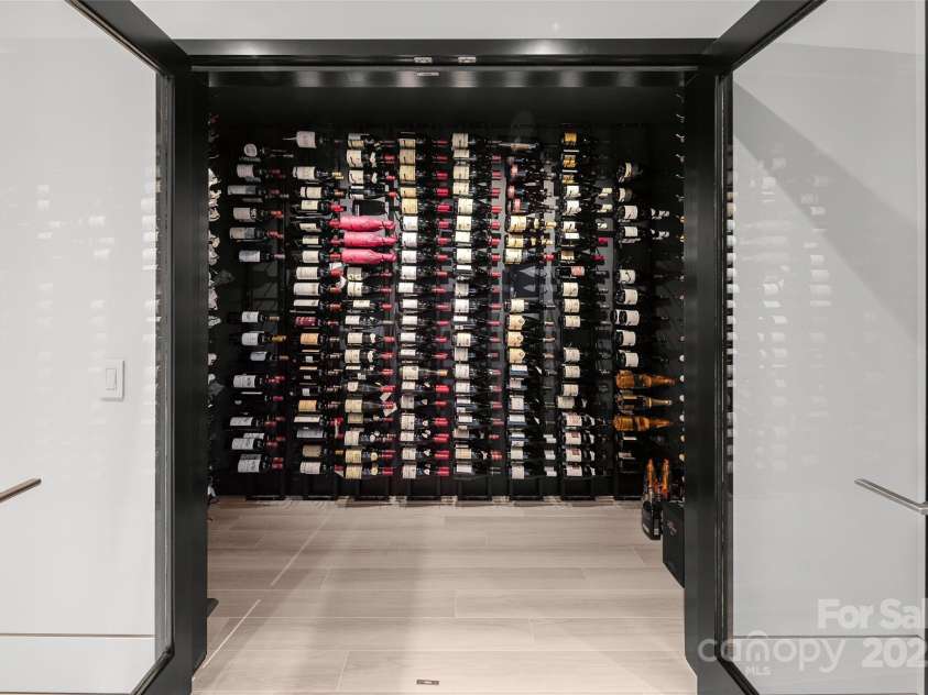 214 Folkestone Lane, Arden, NC 28704.  MLS# CAR4185863, YatesRealty ID 4346. Wine Cellar