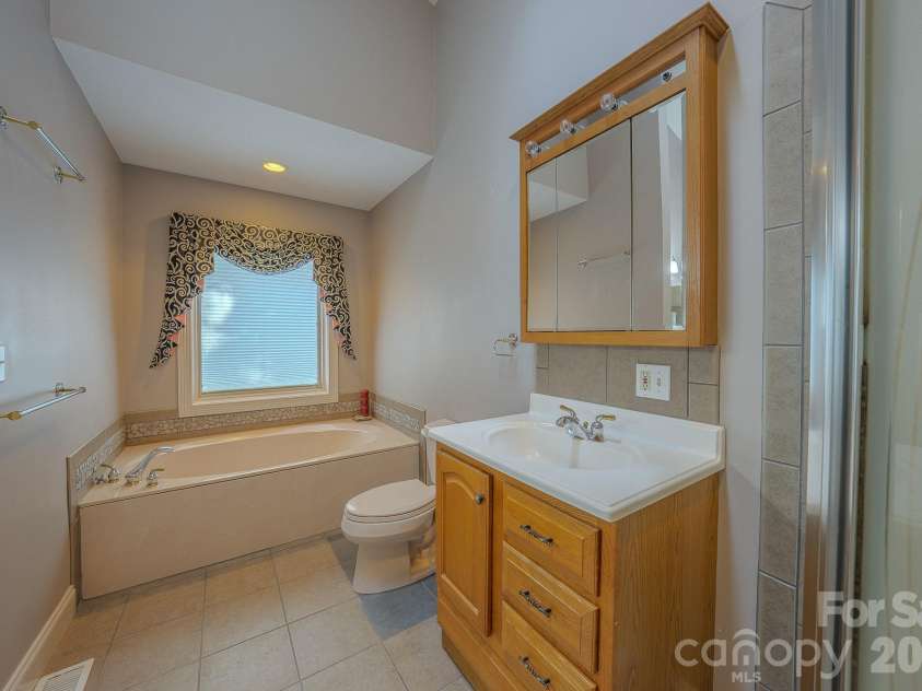 5 Kari Circle, Candler, NC 28715.  MLS# CAR4412820, YatesRealty ID 43469. 