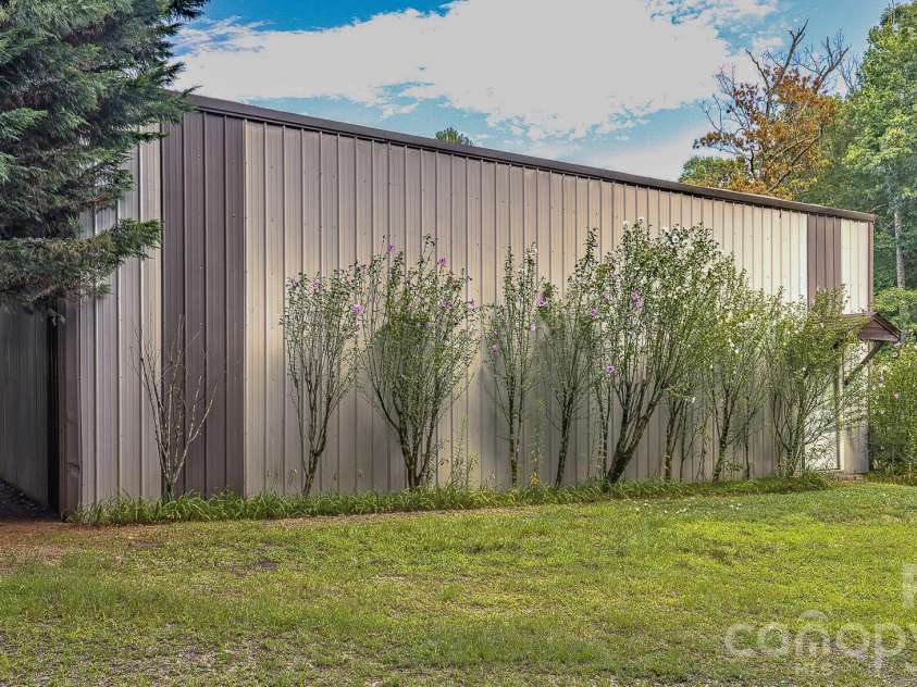 5 Kari Circle, Candler, NC 28715.  MLS# CAR4412820, YatesRealty ID 43469. RV garage or hobby building