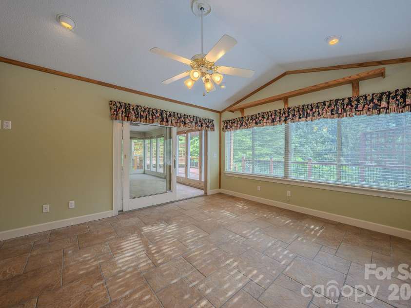 5 Kari Circle, Candler, NC 28715.  MLS# CAR4412820, YatesRealty ID 43469. Sunroom