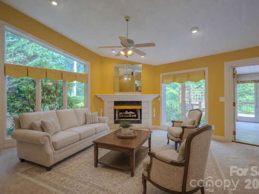 5 Kari Circle, Candler, NC 28715.  MLS# CAR4412820, YatesRealty ID 43469. Virtually staged living room