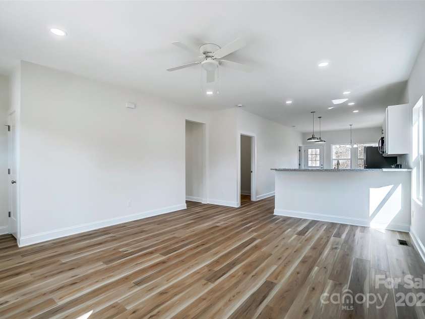 66 Reed Street, Concord, NC 28025.  MLS# CAR4228883, YatesRealty ID 4347. Open Floorplan of Living Room leading to the Kitchen