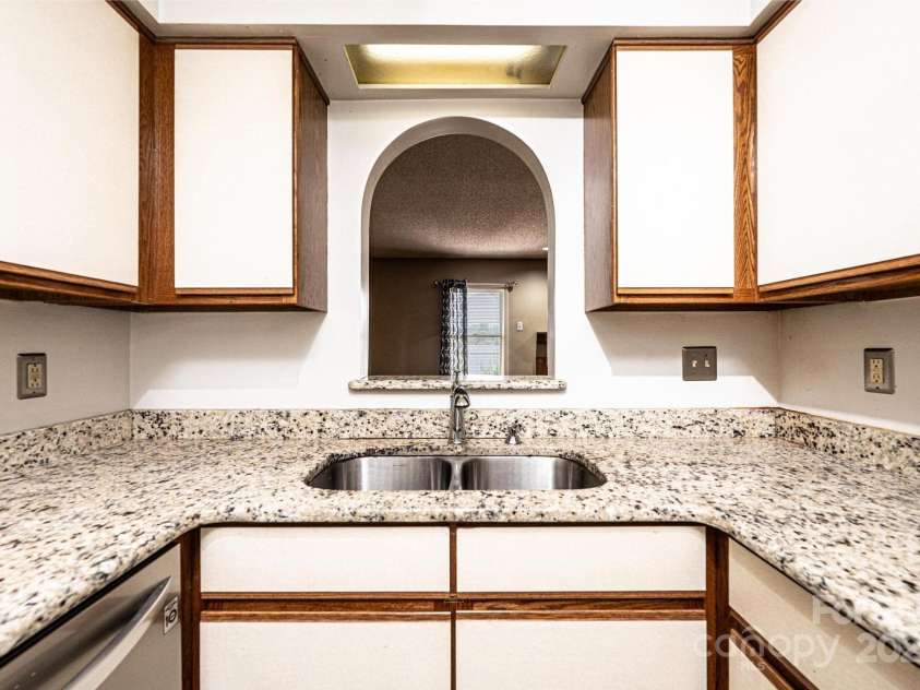 709 21st Avenue, Hickory, NC 28601.  MLS# CAR4276876, YatesRealty ID 4348. Kitchen with pass-thru to Living Room