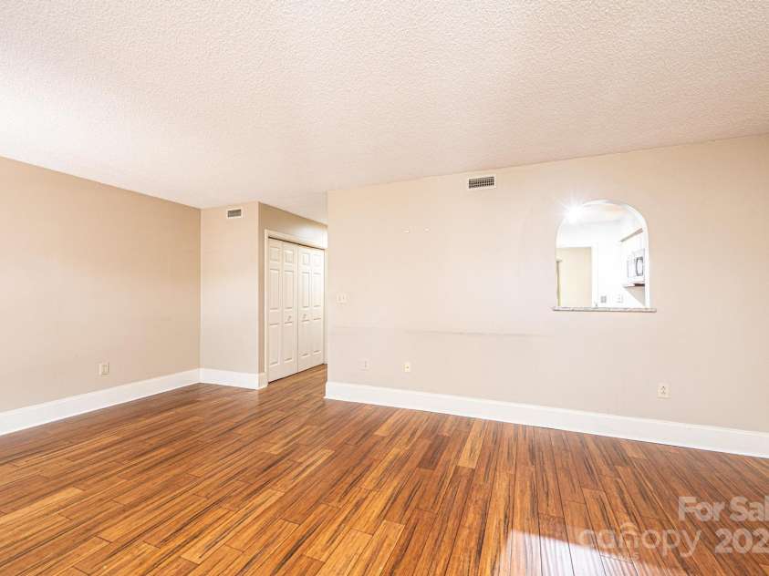 709 21st Avenue, Hickory, NC 28601.  MLS# CAR4276876, YatesRealty ID 4348. Living Room with pass-thru to kitchen