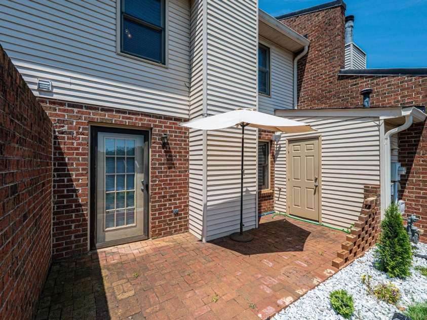 709 21st Avenue, Hickory, NC 28601.  MLS# CAR4276876, YatesRealty ID 4348. Rear Patio & Storage Room