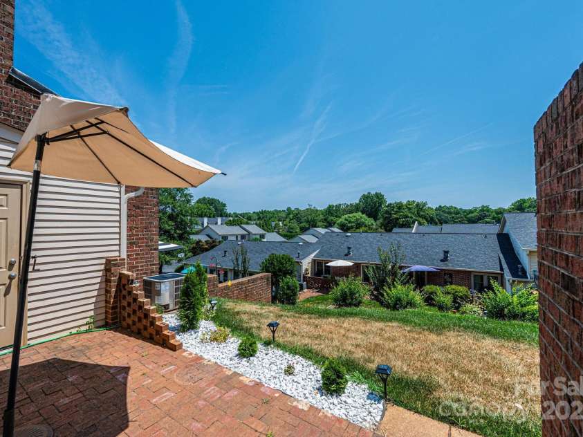 709 21st Avenue, Hickory, NC 28601.  MLS# CAR4276876, YatesRealty ID 4348. Rear Patio & view