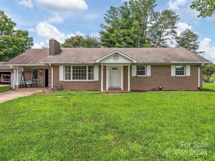 1153 Airport Road, Flat Rock, NC 28731.  MLS# CAR4170827, YatesRealty ID 4350. 