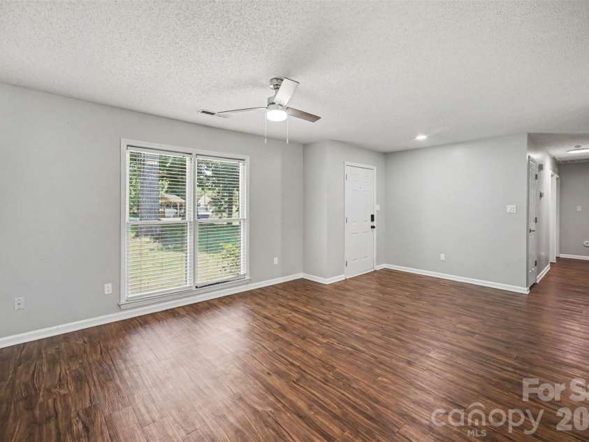 9720 Stillwater Lane, Mint Hill, NC 28227.  MLS# CAR4392489, YatesRealty ID 43501. Living Room